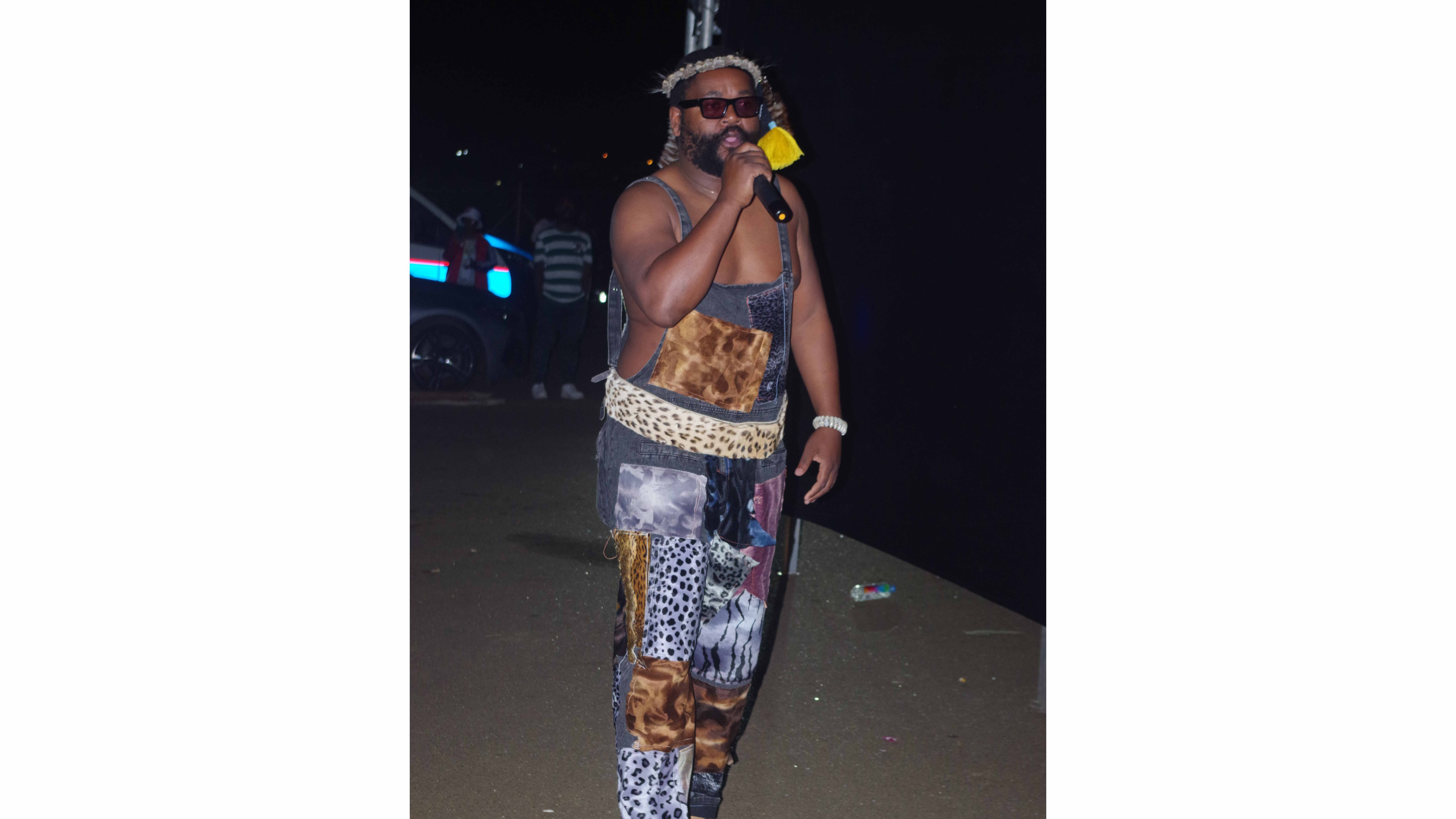 Sjava singing backstage before his main performance.